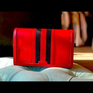 Gucci crossbody wallet with a strap
